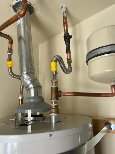 Water heater installation and plumbing repair in The Highlands